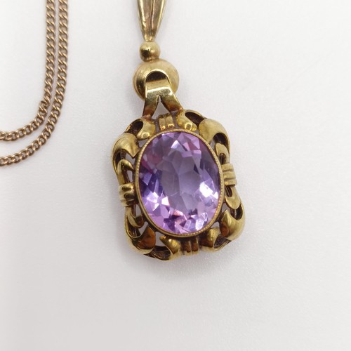 437 - An amethyst pendant, on a 8ct gold chain