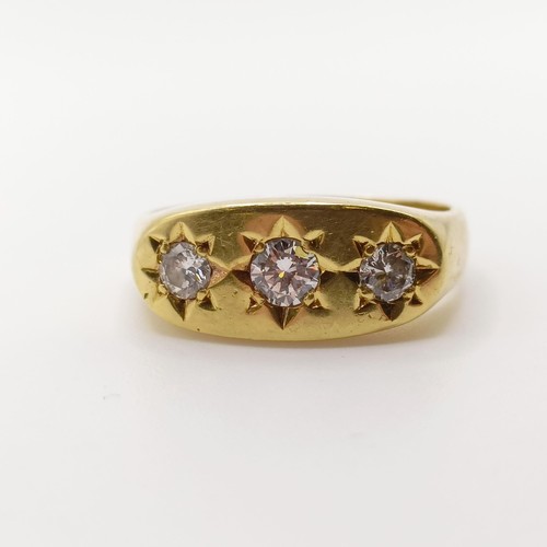 410 - An 18ct gold three stone diamond gypsy set ring, ring size P 1/2