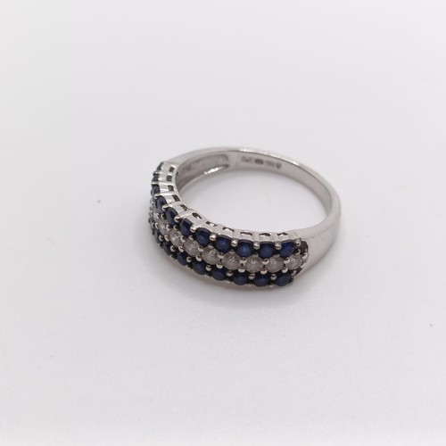 412 - An 18ct white gold, diamond and sapphire ring, ring size L 1/2