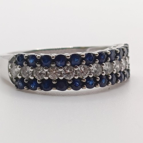 412 - An 18ct white gold, diamond and sapphire ring, ring size L 1/2