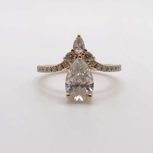 423 - An 18ct gold and lab grown pear shaped diamond ring, ring size J 1/2