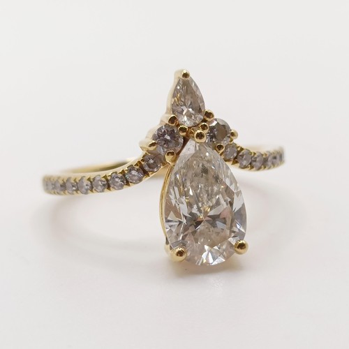 423 - An 18ct gold and lab grown pear shaped diamond ring, ring size J 1/2