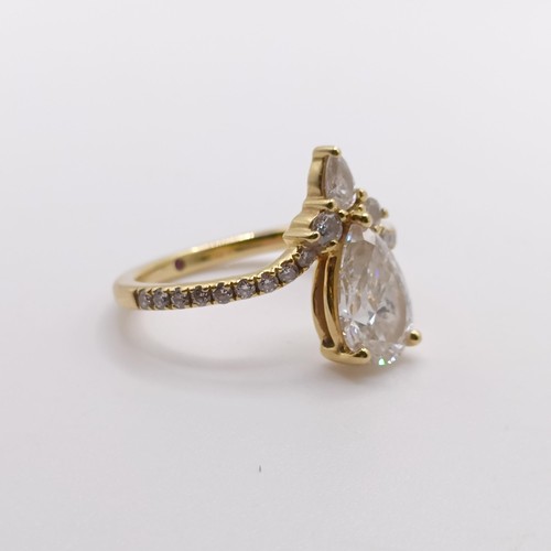 423 - An 18ct gold and lab grown pear shaped diamond ring, ring size J 1/2