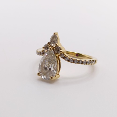 423 - An 18ct gold and lab grown pear shaped diamond ring, ring size J 1/2