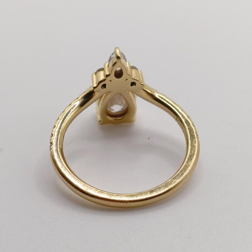 423 - An 18ct gold and lab grown pear shaped diamond ring, ring size J 1/2