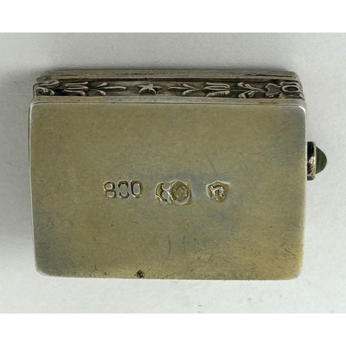 413 - A Continental gilt silver coloured metal and moss agate type green stone box, 3 cm wide