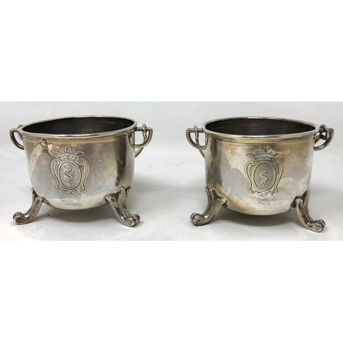 233 - A pair of Continental silver coloured metal salts, in the form of swing handled buckets (2)