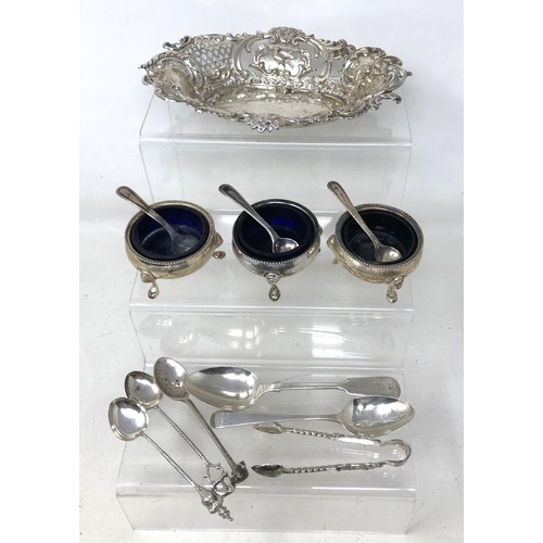 242 - A set of three silver salts, assorted spoons and a pierced dish, various dates and marks (13)