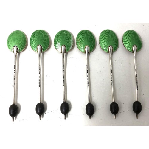 246 - A set of six George V silver and green enamel coffee spoons, and a set of six coffee spoons (12)