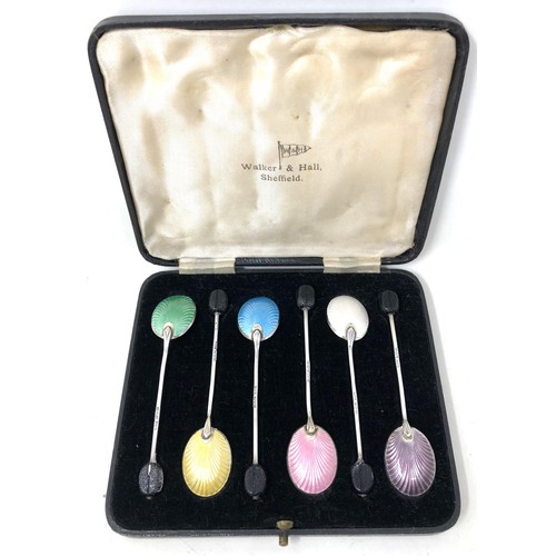 250 - A set of six George V silver and multi-coloured enamel coffee spoons, with carved wooden bean finial... 