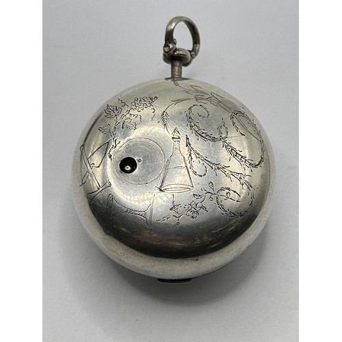 386 - An 18th century silver pair cased pocket watch, the enamel dial with Roman numerals, the movement si... 