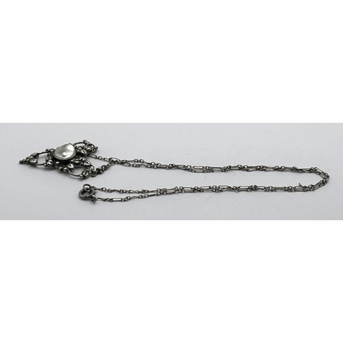 402 - An Arts and Crafts silver coloured metal and shell necklace, by Jean BassettProvenance:  Descent thr... 