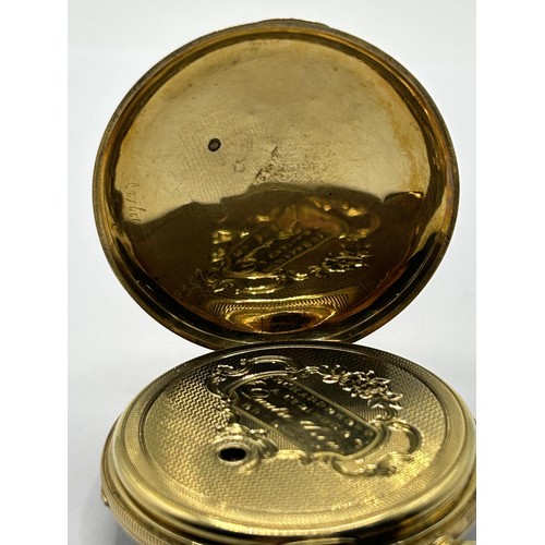 384 - An 18ct gold open face pocket watch, the enamel dial with Roman numerals, the dust cap with engraved... 