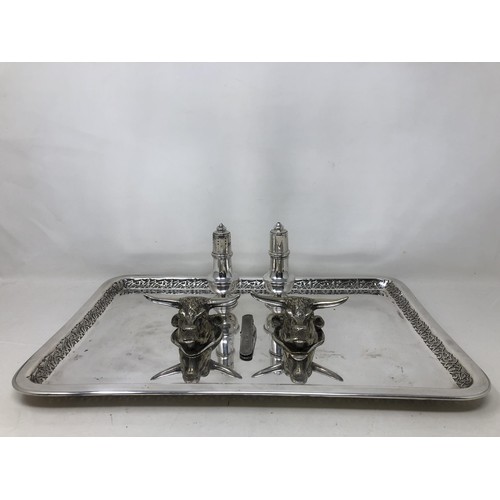 257 - A pair of silver plated knife rests, in the form of bull heads, a silver pepper and salt, a silver c... 