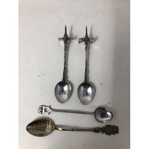 257 - A pair of silver plated knife rests, in the form of bull heads, a silver pepper and salt, a silver c... 