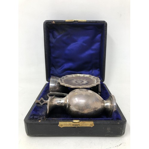 260 - A Victorian silver communion set, comprising a chalice, ewer and stand, Birmingham 1885, all in 2.5 ... 