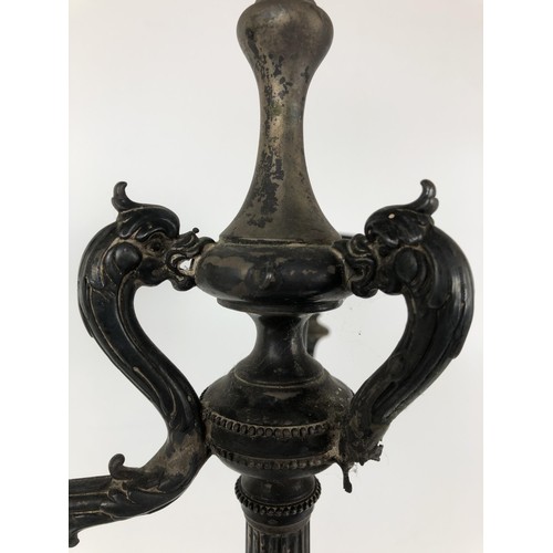 261 - A Victorian silver candelabrum, lacking one branch, the base with griffin mounts, with a presentatio... 