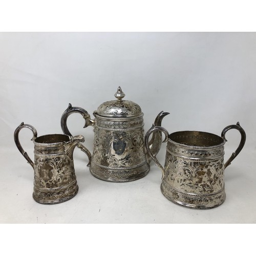 276 - A Victorian silver three piece tea service, by Thomas Bradley & Son, London 1873, 40 ozt Ivory E... 