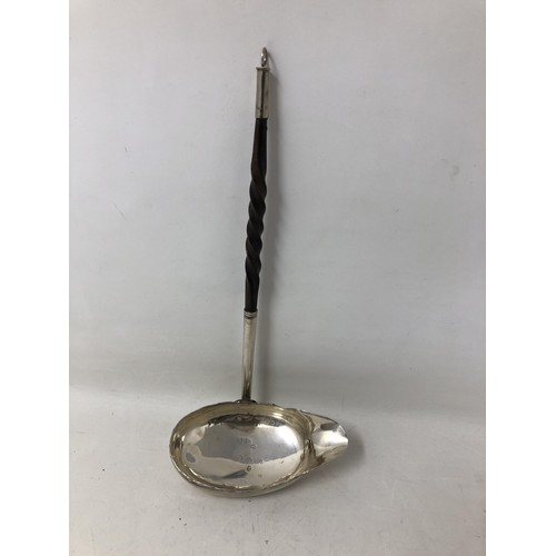 286 - A 19th century silver and carved wood toddy ladle, and two others (3)