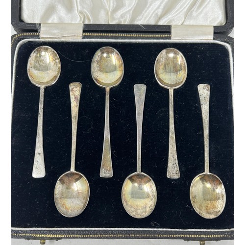 311 - A set of six silver coffee spoons, cased, a pair of salts, a knife, fork and spoon, a mustard pot, t... 