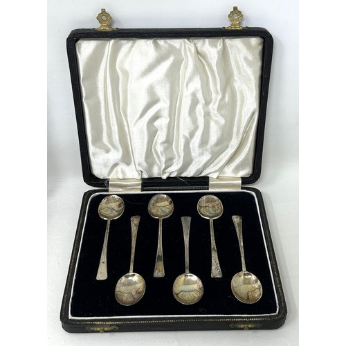 311 - A set of six silver coffee spoons, cased, a pair of salts, a knife, fork and spoon, a mustard pot, t... 