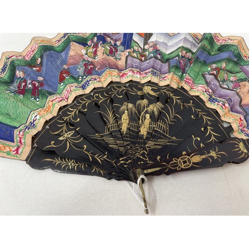 802 - A Chinese lacquered fan, decorated figures, paper painted interior scene, 9.5 cm