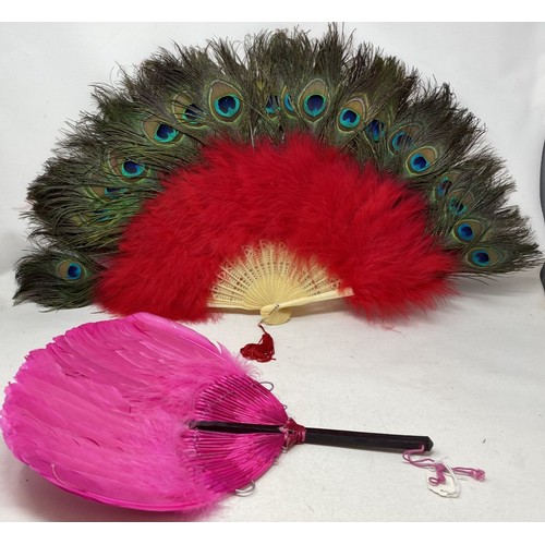 806 - A bakelite and feather fan, 48 cm, and three other feather fans (4)