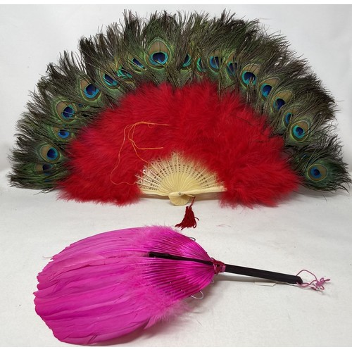 806 - A bakelite and feather fan, 48 cm, and three other feather fans (4)