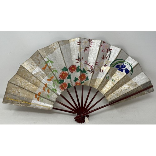 807 - A carved ebony fan, lace painted flowers, 36 cm, and five other fans  (6)