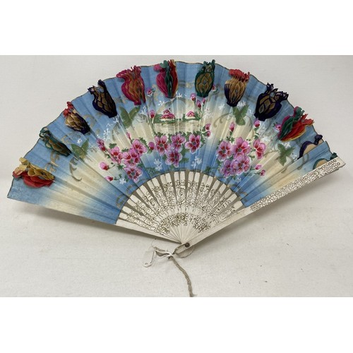 808 - A painted wooden fan, painted a tavern scene, 29 cm, and four other fans (5)