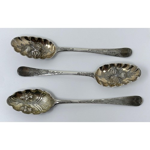 318 - A pair of George III silver spoons, later decorated, and another spoon, 5.6 ozt (3)