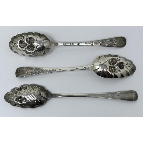 318 - A pair of George III silver spoons, later decorated, and another spoon, 5.6 ozt (3)