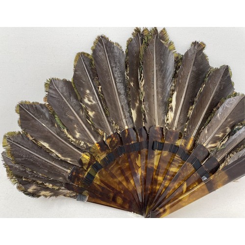 816 - A fancy feather fan, 16 cm