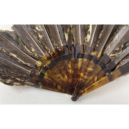 816 - A fancy feather fan, 16 cm