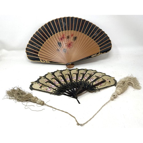 817 - A carved wood fan, silk painted flowers, 25 cm, boxed, and three other fans (4)