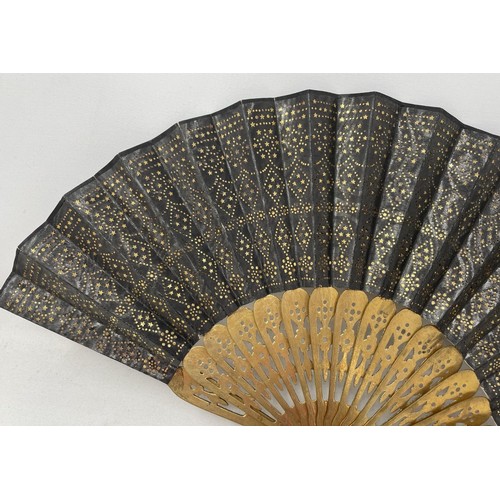 820 - An ebonised fan, the silk painted flowers, 25 cm, boxed, and five other fans (6)