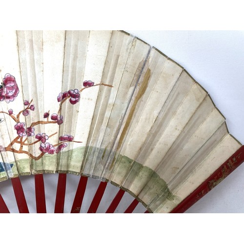 821 - A Chinese carved fan, the paper decorated a landscape, 29 cm, a lacquered fan box, and a lacquered f... 