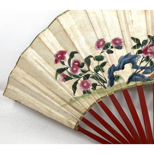 821 - A Chinese carved fan, the paper decorated a landscape, 29 cm, a lacquered fan box, and a lacquered f... 