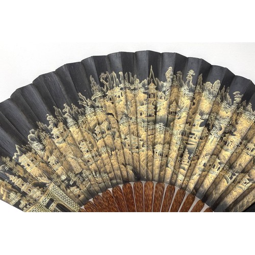 821 - A Chinese carved fan, the paper decorated a landscape, 29 cm, a lacquered fan box, and a lacquered f... 