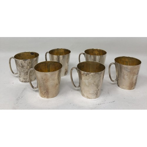 303 - A set of six Indian silver coloured metal cups, cased Provenance: Sold on behalf of SNCBS