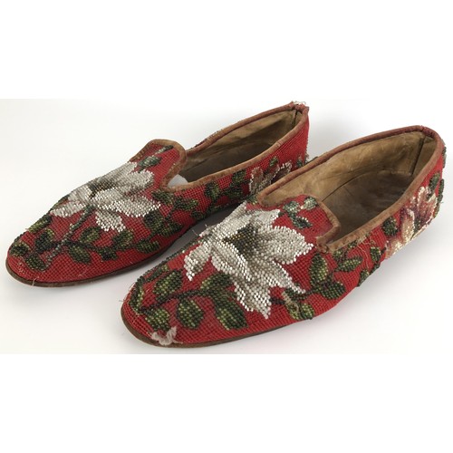 824 - A pair of late 19th/early 20th century beadwork slippers, decorated flowers