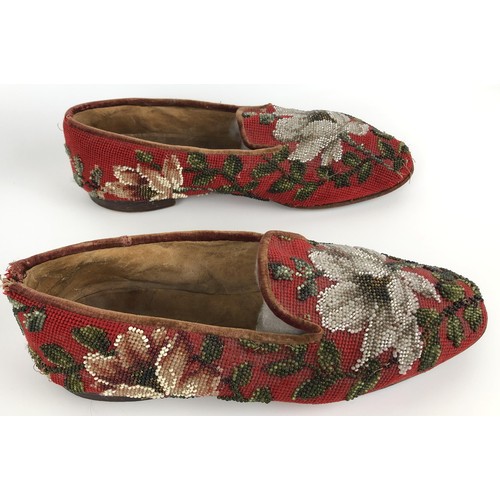 824 - A pair of late 19th/early 20th century beadwork slippers, decorated flowers