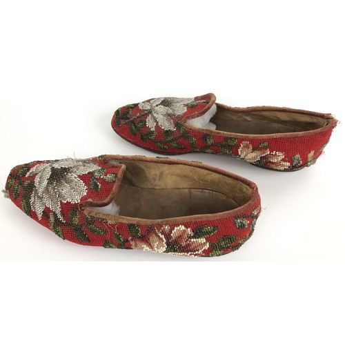 824 - A pair of late 19th/early 20th century beadwork slippers, decorated flowers