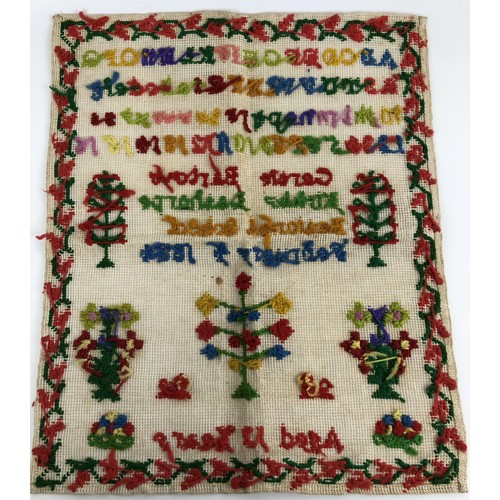 831 - A Victorian sampler, signed Gertie Barlow of Kirkby Landthorpe National School, aged 12 years old, d... 