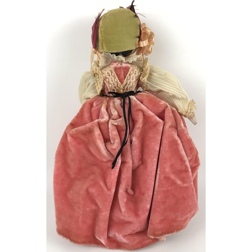 839 - A Grodnertal style painted wooden doll, 30 cm Provenance: Sold on behalf of SNCBS