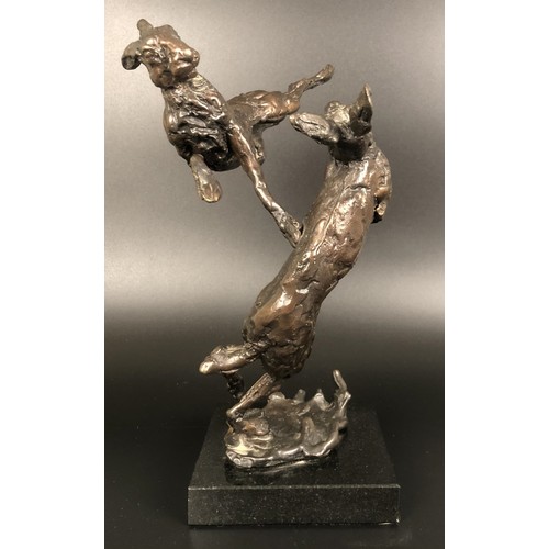 951 - ***Withdrawn*** A bronze group,  of two hares boxing, on a polished slate base, 24 cm high