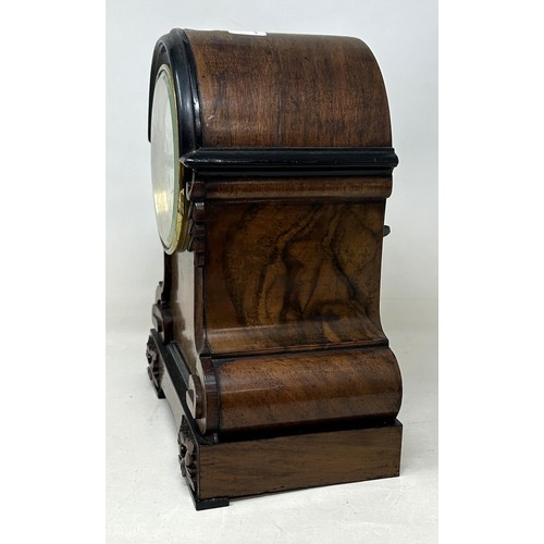 975 - A mantel clock, by Aubert & Co, with an eight day movement, in a walnut case, 25 cm high