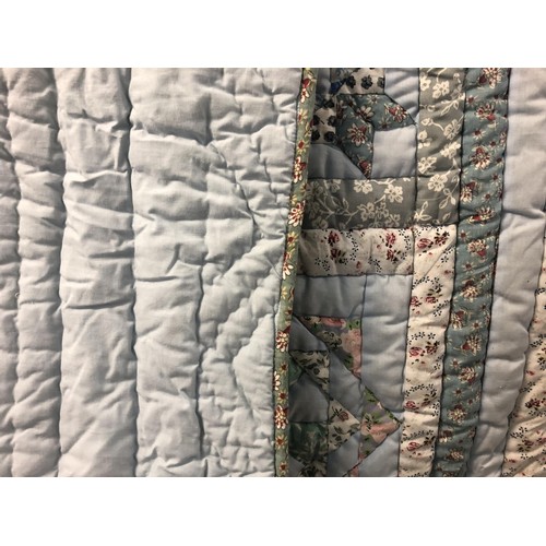 854 - A vintage patchwork quilt