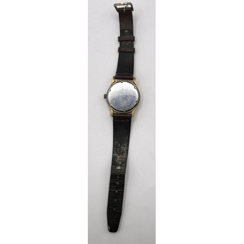 393 - A gentleman's Smiths Deluxe wristwatch, on an associated leather strap