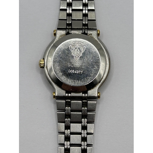 395 - A ladies stainless steel Gucci wristwatch, cased